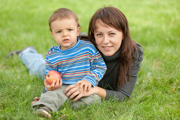 Portrait of a mother and her son outdoors