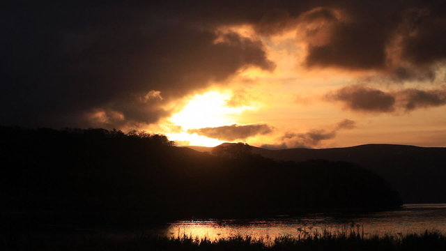 sunset at coast of the sea