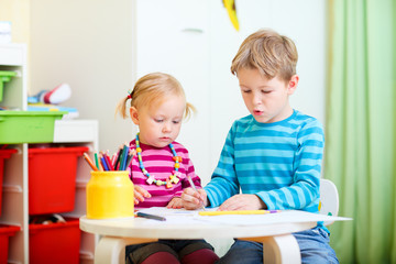 Brother and sister drawing