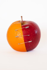 Merge of apple and orange - isolated on white