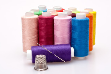 colored thread for sewing with needle and thimble