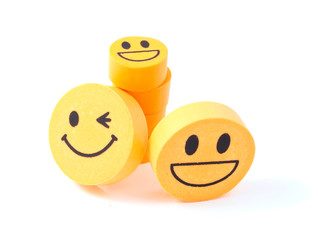 eraser with the image of a smiley