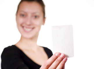 Businesswoman showing a blank business card