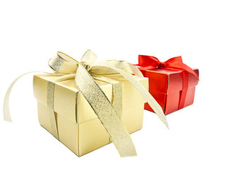 Golden gift box and red gift box on white background