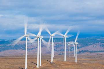 Wind turbines with fast moving blades under strong gust