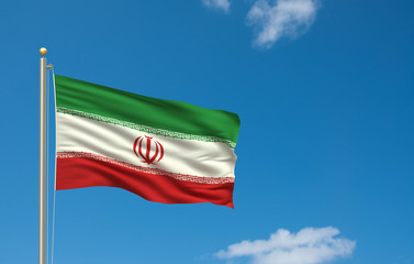 Flag of Iran waving in the wind in front of blue sky