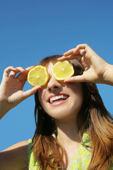 smiling girl with lemon