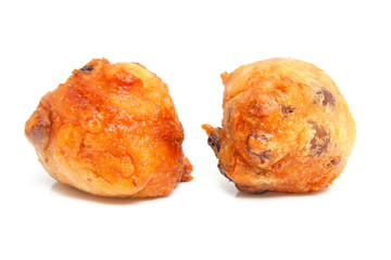 Dutch donut also known as oliebollen over white background