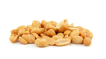 salted peanuts over white background