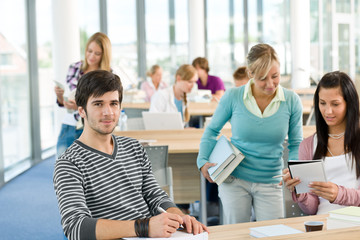 High school - three students in classroom