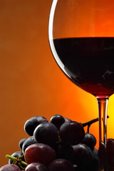Red wine and grapes
