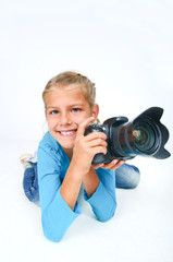 Girl with a camera big lens.