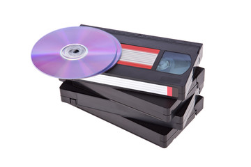 Old Video Cassette tapes with DVD discs isolated