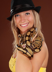 woman holding a snake