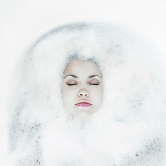 Young girl in the suds