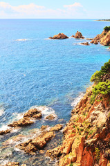 view of sea and rocks in sunny weather