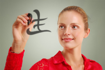 beautiful woman writing hieroglyph 