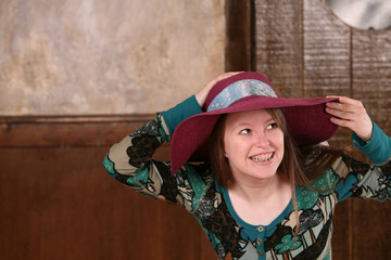 teen girl in hat