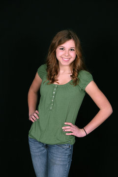 young teen in green shirt