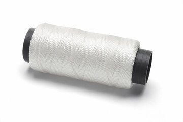 Bobbin of white thread