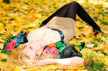 young woman resting on the ground