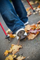 Nordic walking race on autumn trail