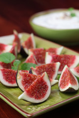Black mission fig appetizer with nut and honey cheese dip