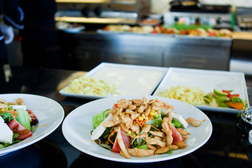 Plates of healthy and colorful salad