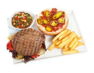 Grilled steak fillet with french fries and sauce
