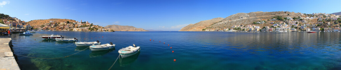 Fototapeta na wymiar Simi island near Rhodos. Greece. View to boats and to the bay