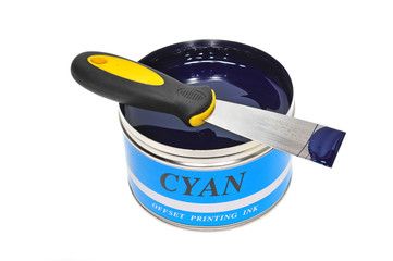 A Can Of Cyan Offset Printing Ink With A Ink Knife