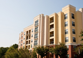 Yellow and Brown Apartments on Blue