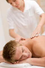 Fototapeta na wymiar Man having luxury back massage