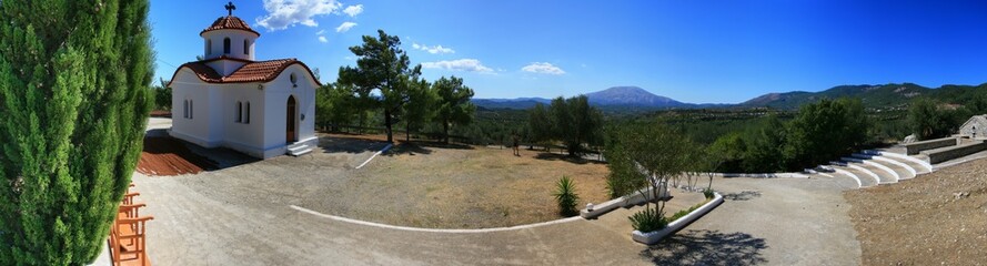 Small Orthodox church and the mountain landscape