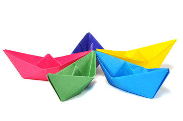Close up origami ship over white