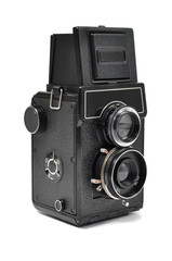 Old middle-format camera over white