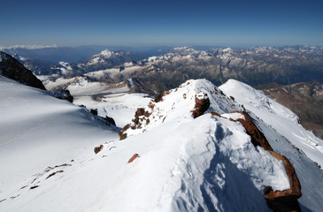 Snow rocks in high mountains from peak Elbrus, Caucasus