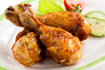 Roasted chicken drumsticks and vegetables