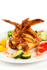 Grilled chicken wings with vegetables