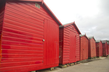 Red huts, grey sky