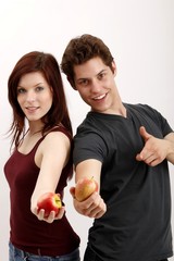 young couple with apples