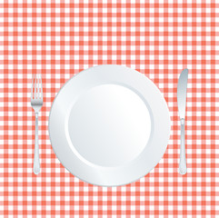 plate on tablecloth