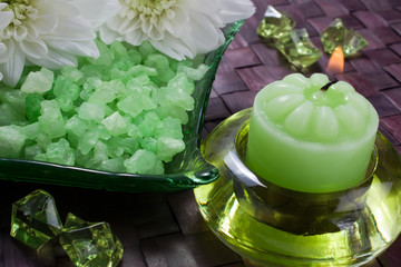 Aroma candle, bath salt and chrysanthemums for aromatherapy