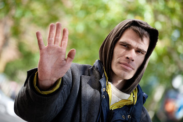 Homeless Men with hand outstretched