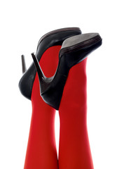 Woman's Ankles In High Heel Shoes and Red Tights. Model Released