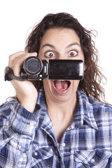 Woman watching video camera scared