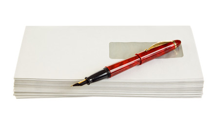 envelopes for letters and pen