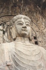 Obraz premium Longmen Caves in Luoyang. Statue of Buddha.