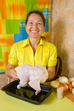 Woman Is Cooking Stuffed Chicken