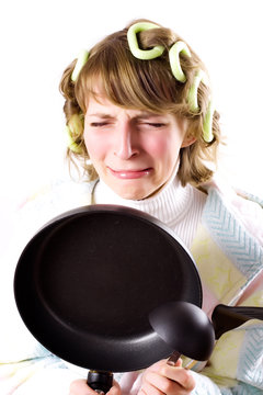 crying housewife with pan